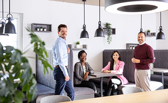 Employees having coffee together - Employees engagement - ALDI Culture